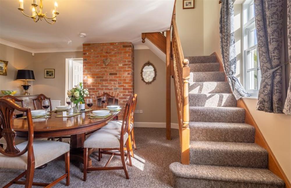 Dining room and stairs to the first floor at Maltings Lodge, Chelsworth