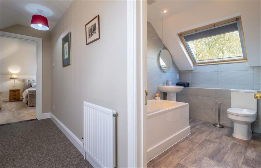 Landing and views of the family bathroom at Maltings Lodge, Chelsworth