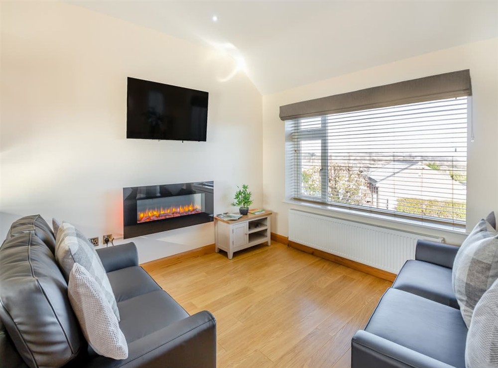 Open plan living space at Manawydan Cottage in Pentraeth, Gwynedd