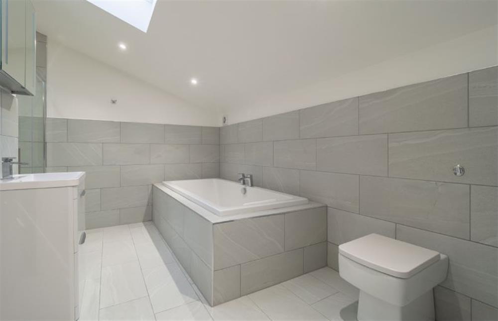 Family bathroom with bath, shower cubicle, wash basin and WC at Mandalore, Henham