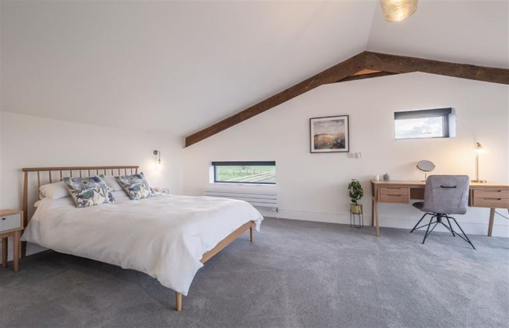 Master bedroom with 5’ king-size bed at Mandalore, Henham