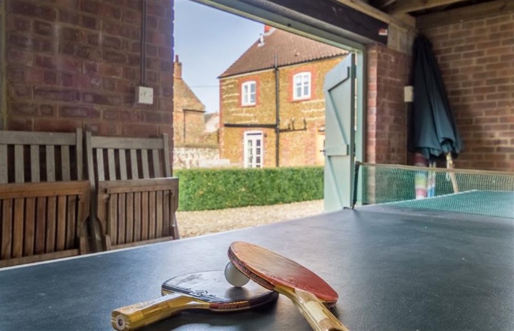 At the bottom of the garden is a room with a full size table tennis table at Manningham House, Ringstead near Hunstanton