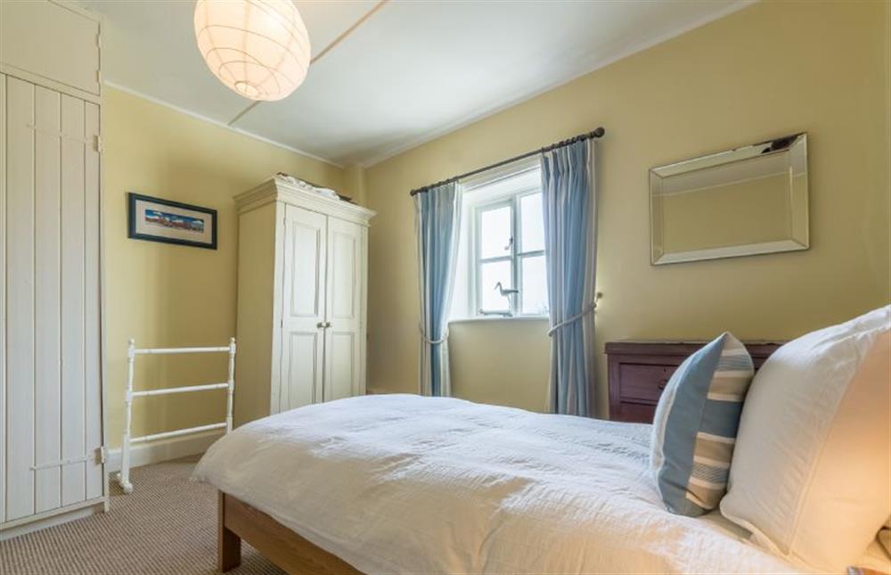 First floor: Bedroom three has single bed and views over fields at Manningham House, Ringstead near Hunstanton