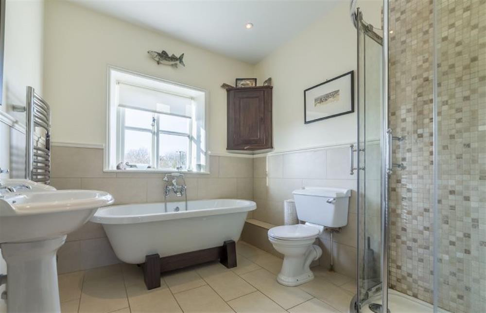 First floor: Family bathroom with bath and separate shower at Manningham House, Ringstead near Hunstanton