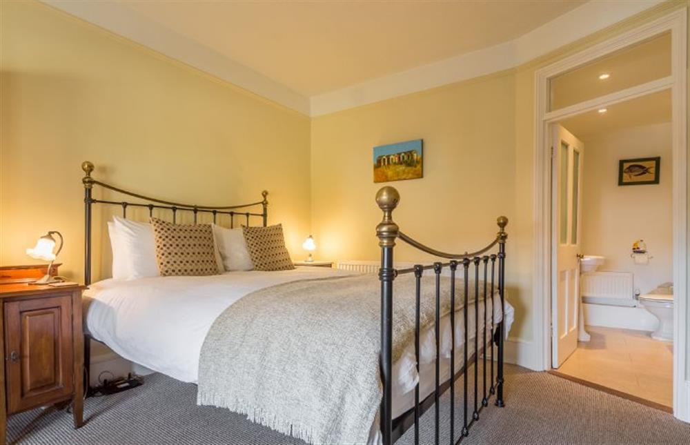 First floor: Master bedroom has en-suite bathroom at Manningham House, Ringstead near Hunstanton