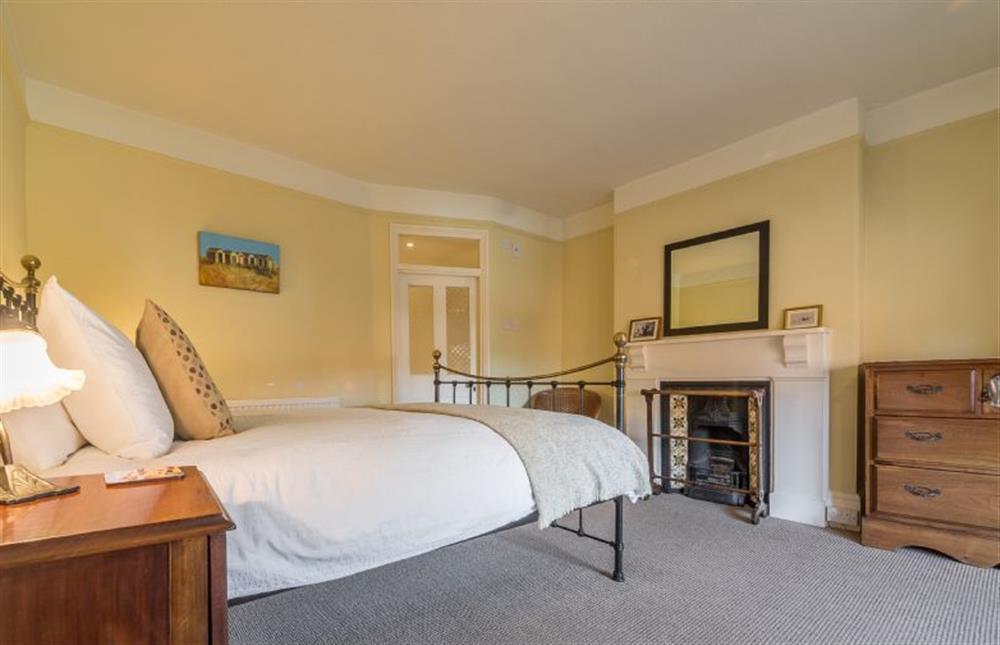 First floor: Master bedroom has king-size bed at Manningham House, Ringstead near Hunstanton