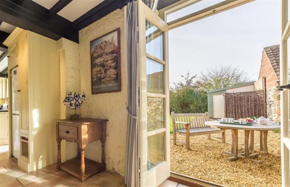 Ground floor: French doors lead into the garden at Manningham House, Ringstead near Hunstanton