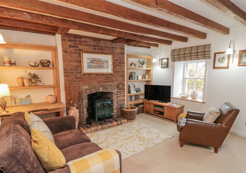 Enjoy the living room at Manor Cottage, Cloughton