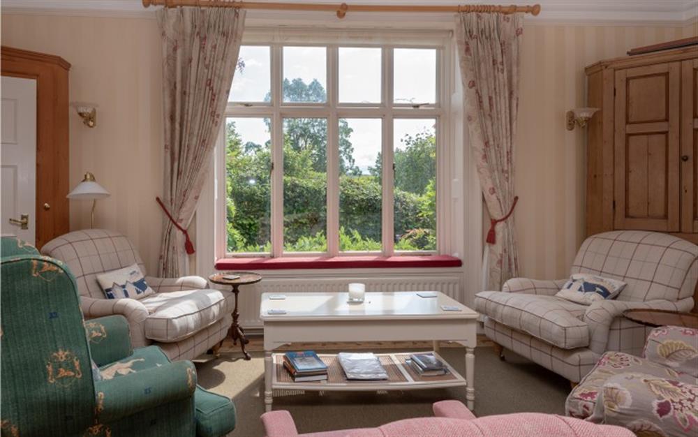One area of the spacious living room. at Manor Cottage in Dittisham
