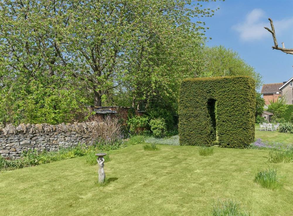 Large enclosed lawned garden at Manor Cottage in Eckington, near Pershore, Worcestershire