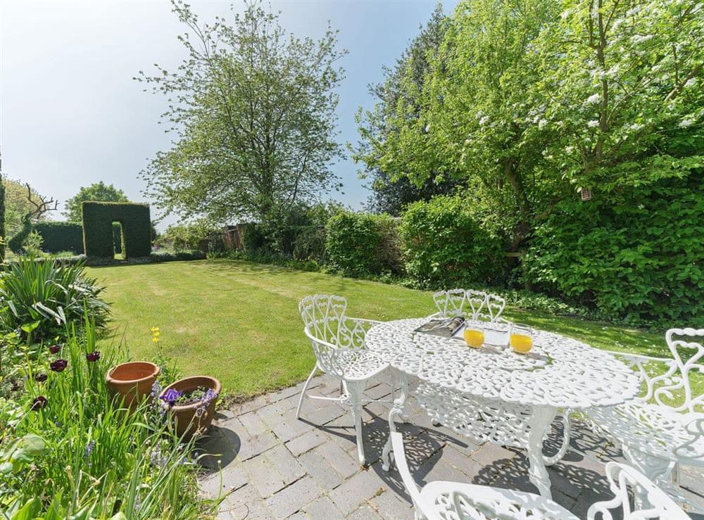 Peaceful sitting-out-area overlooking garden at Manor Cottage in Eckington, near Pershore, Worcestershire