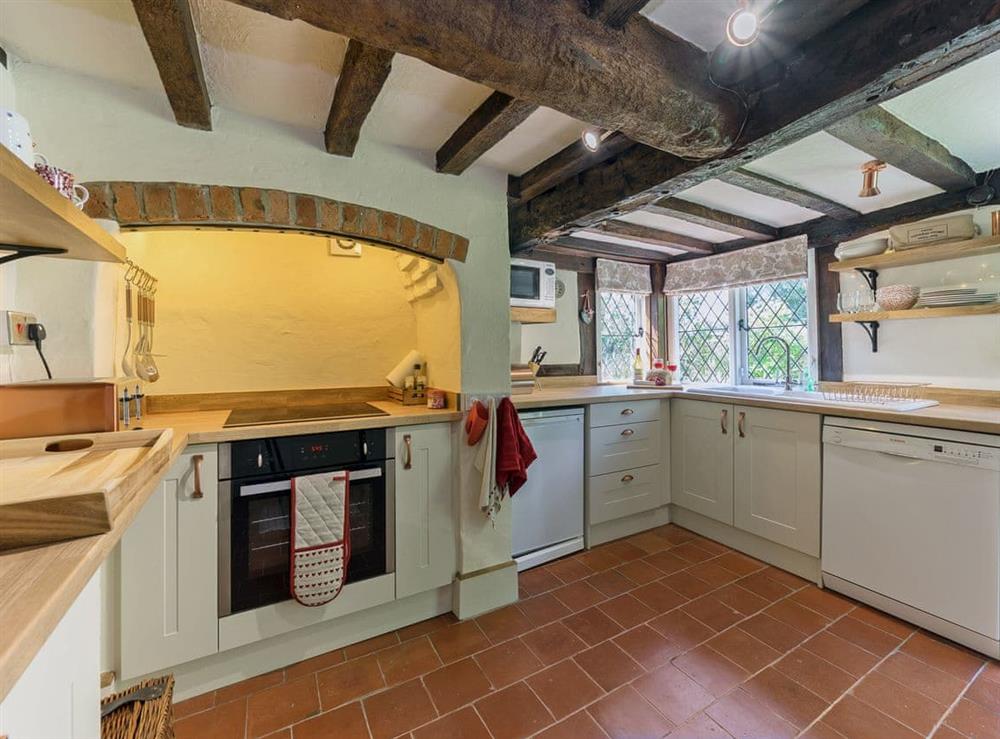 Spacious kitchen with beams (photo 3) at Manor Cottage in Eckington, near Pershore, Worcestershire