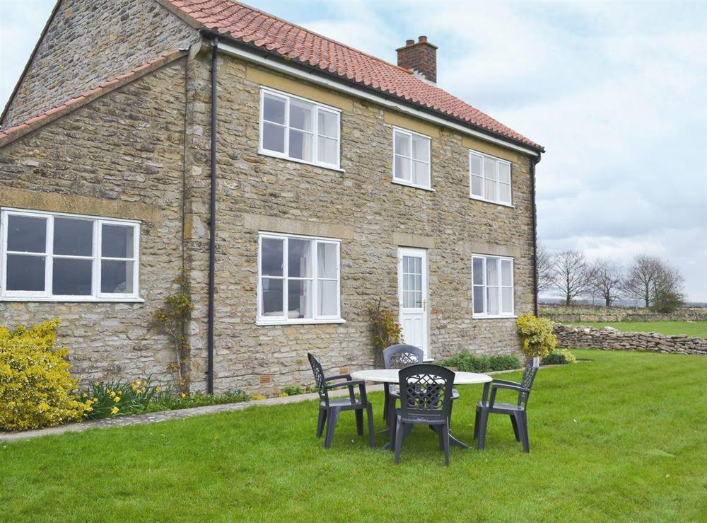 Attractive stone property with large garden and seating area at Manor Cottage in Old Byland, near Helmsley, North Yorkshire