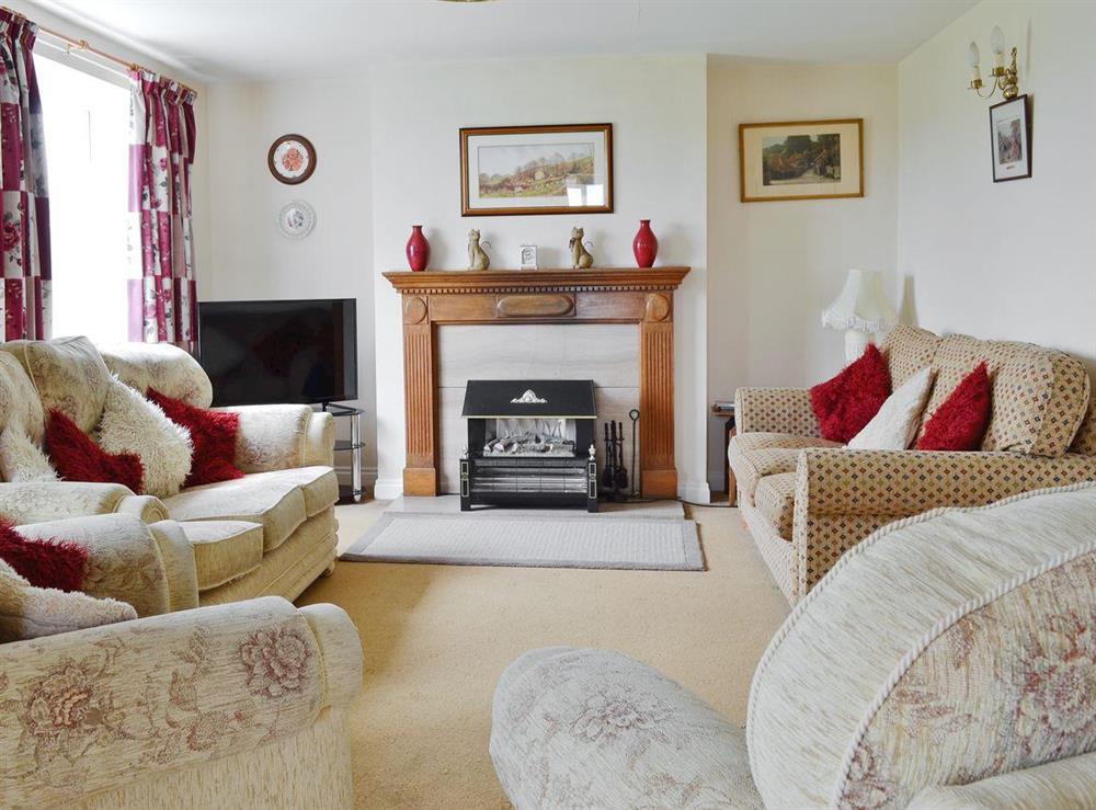 Cosy living room at Manor Cottage in Old Byland, near Helmsley, North Yorkshire