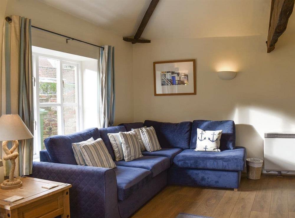 Comfortable seating within living area at Manor Cottage in Stiffkey, near Wells-next-the-Sea, Norfolk