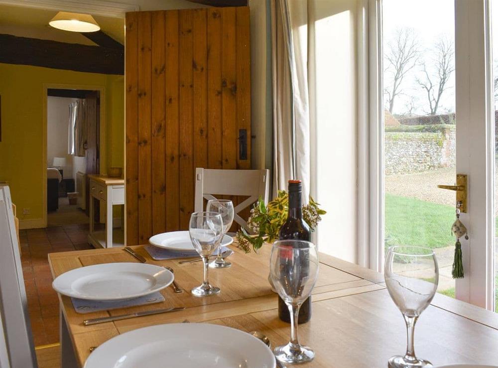 Light and airy dining space at Manor Cottage in Stiffkey, near Wells-next-the-Sea, Norfolk