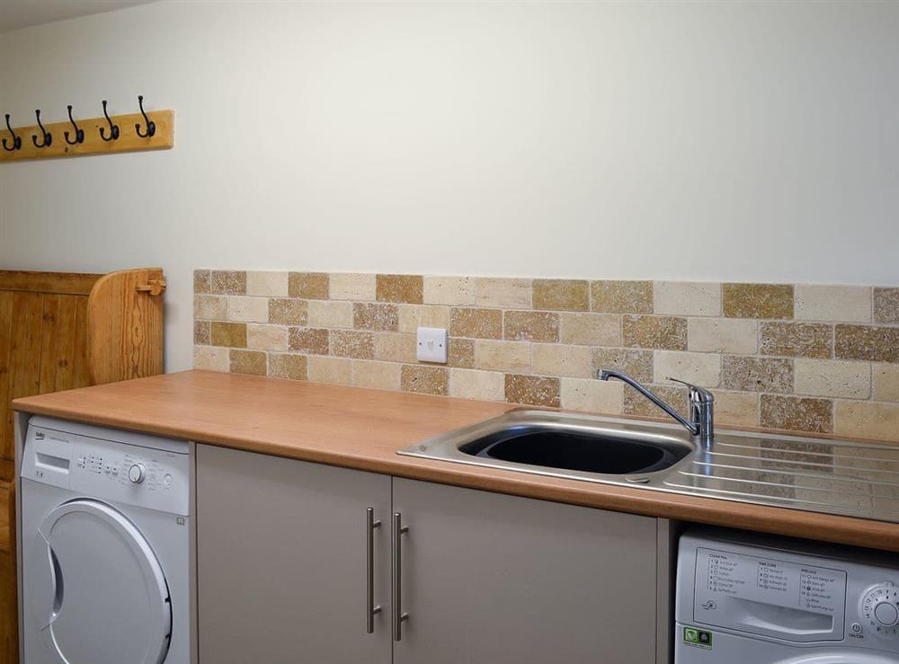 Utility room at Manor Cottage in Wardlow, near Buxton, Derbyshire, England