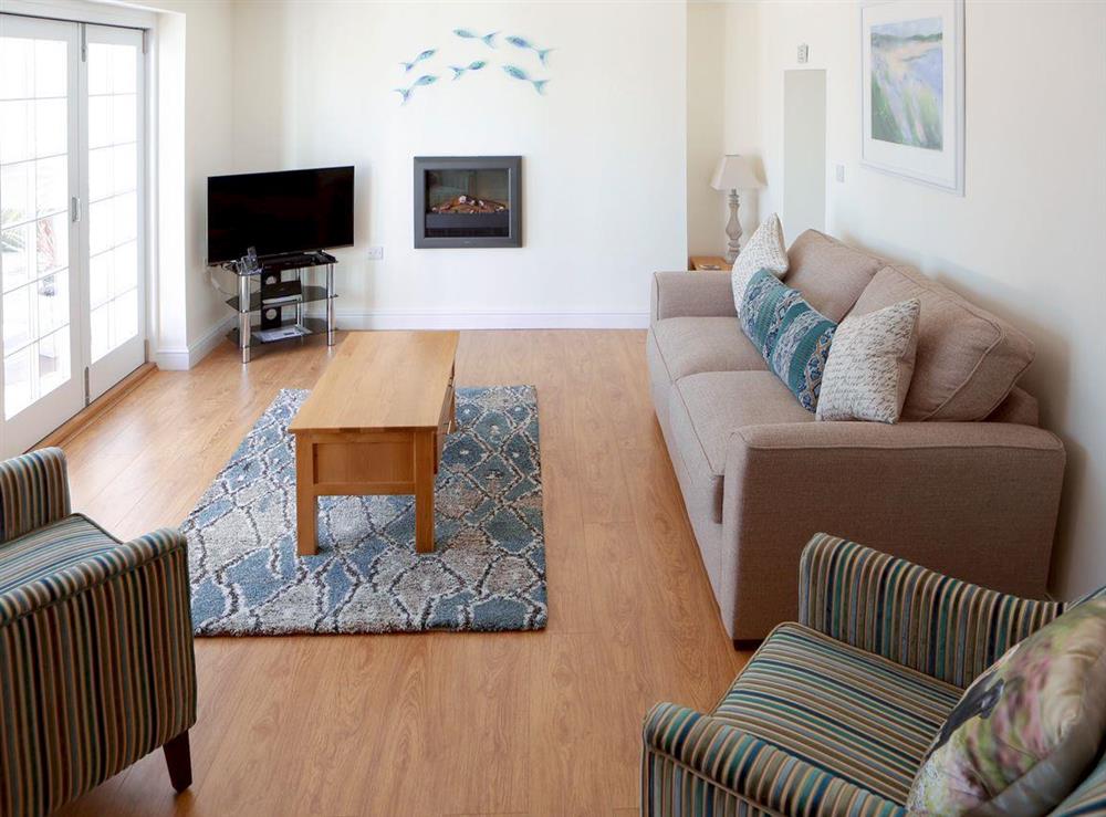 Spacious living room at Manor Cottage in West Pentire, Cornwall., Great Britain