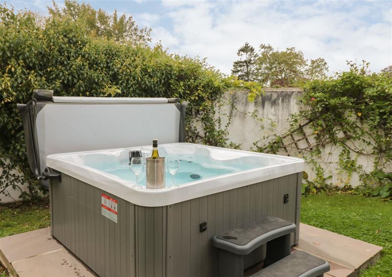 Enjoy the hot tub at Manor Cottages, Bratton Clovelly