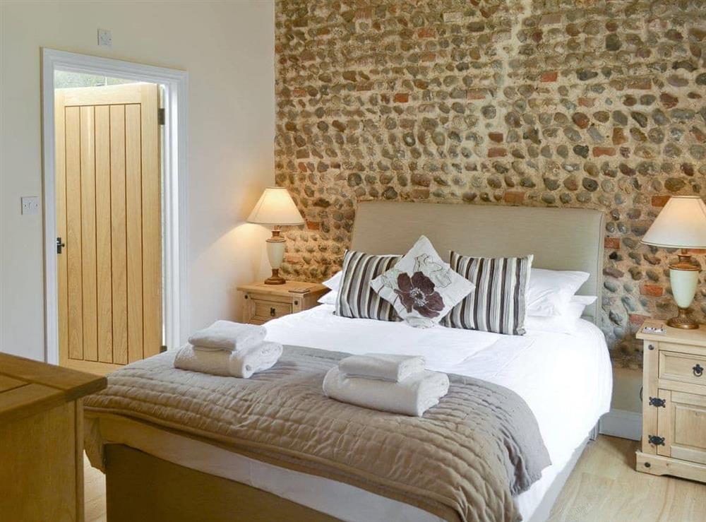 Comfortable double bedroom with en-suite facilities at Stags Rest, 