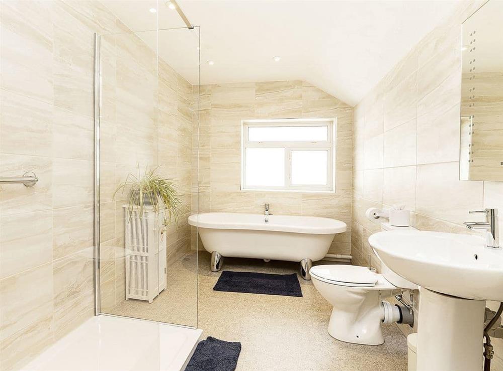 Luxurious bathroom with roll top bath at Manor Farm in Daccombe, near Torquay, Devon