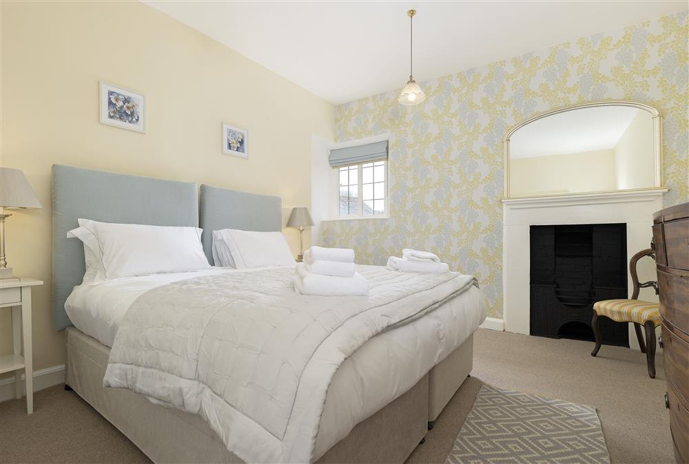 Bedroom three with 6’ super-king size zip and link bed at Manor Farm, Grafton, Nr Beckford