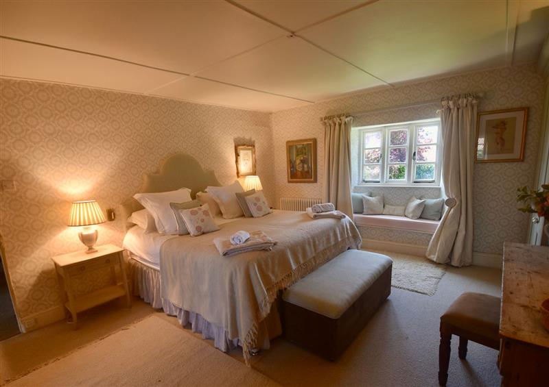 One of the 4 bedrooms at Manor Farm House, Failand