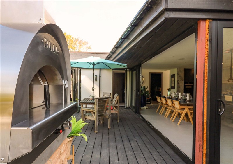 Enjoy a cup of tea on the patio at Manor Farm House, Merton near Bicester