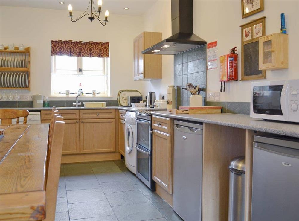 Well equipped kitchen area at Manor Farm Retreat in Hainford, near Norwich, Norfolk