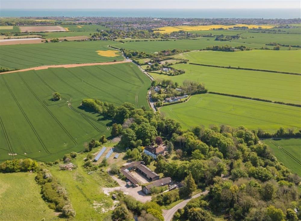 Aerial view looking towards the coast at Manor Farmhouse in Deal, England