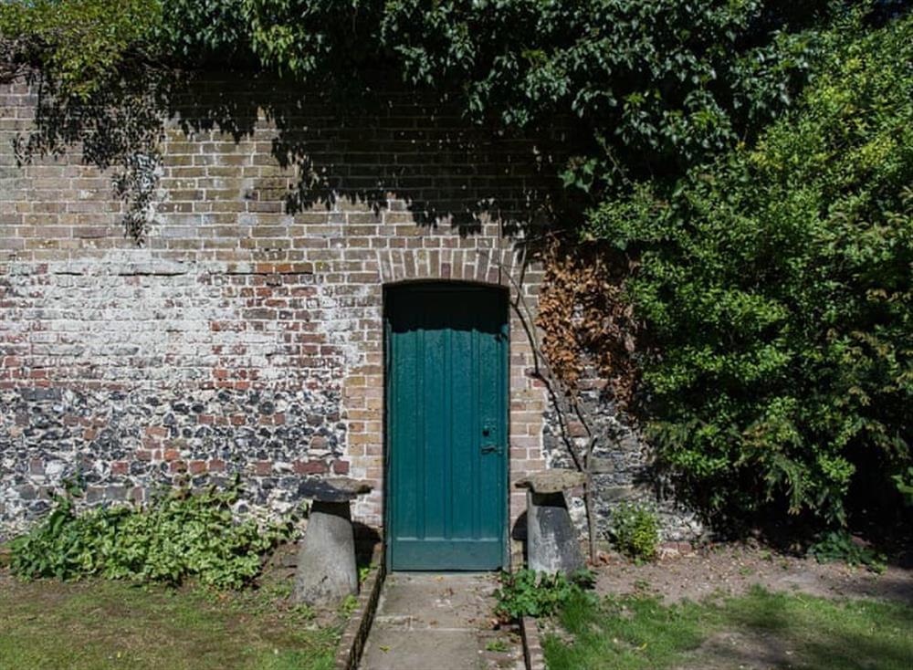Characterful walled garden at Manor Farmhouse in Deal, England
