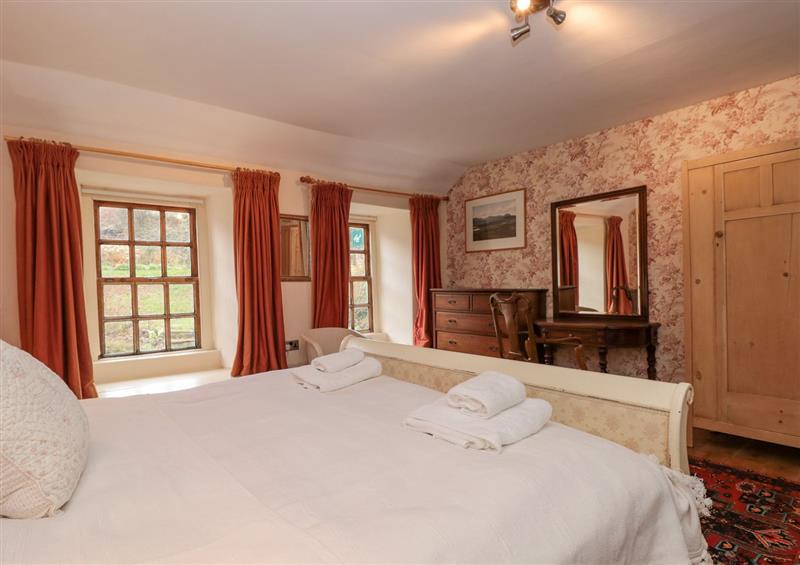 One of the 6 bedrooms at Manor Farmhouse, Dittisham