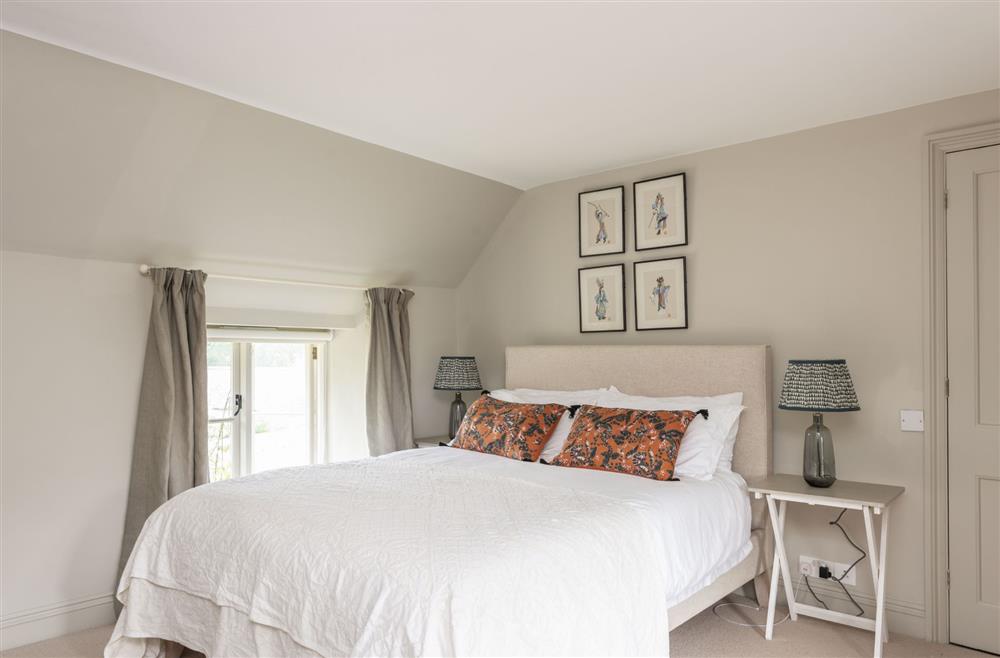 King-size bedroom with en-suite bathroom at Manor Farmhouse, Dorchester