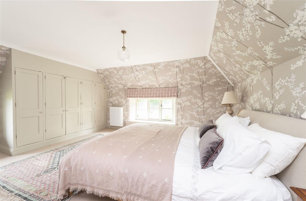 Master bedroom with en-suite bathroom (photo 2) at Manor Farmhouse, Dorchester