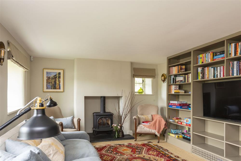 Snug and family television room with gas fire at Manor Farmhouse, Dorchester