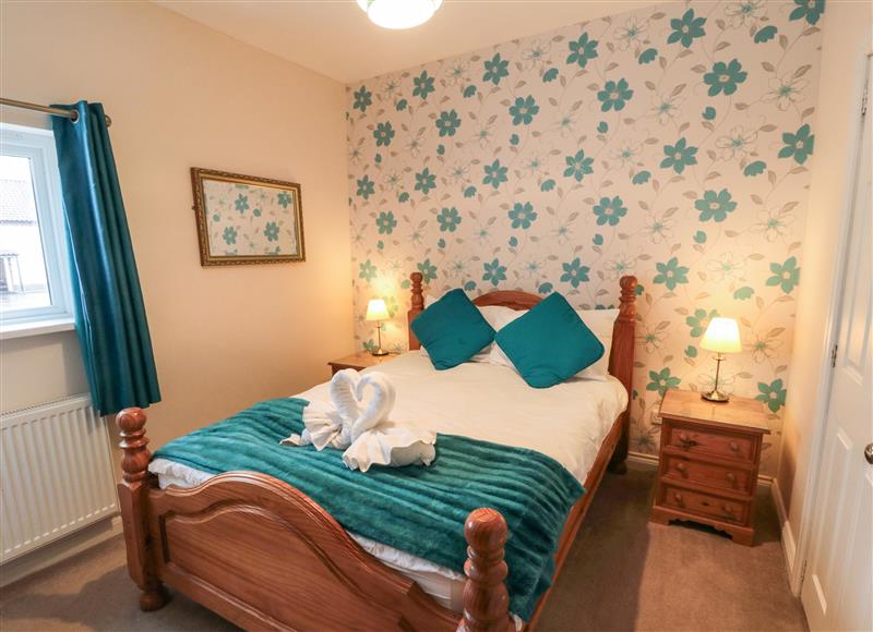A bedroom in Manor Farmhouse at Manor Farmhouse, Reighton near Filey