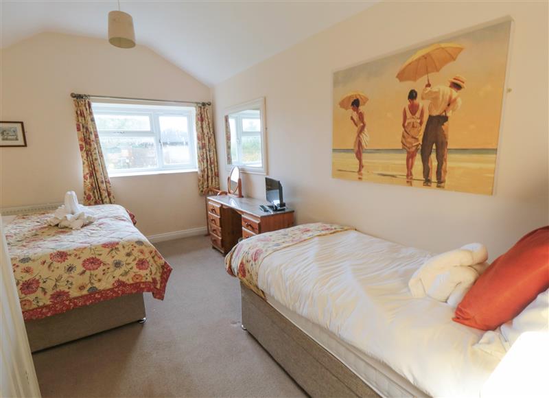 One of the 8 bedrooms at Manor Farmhouse, Reighton near Filey