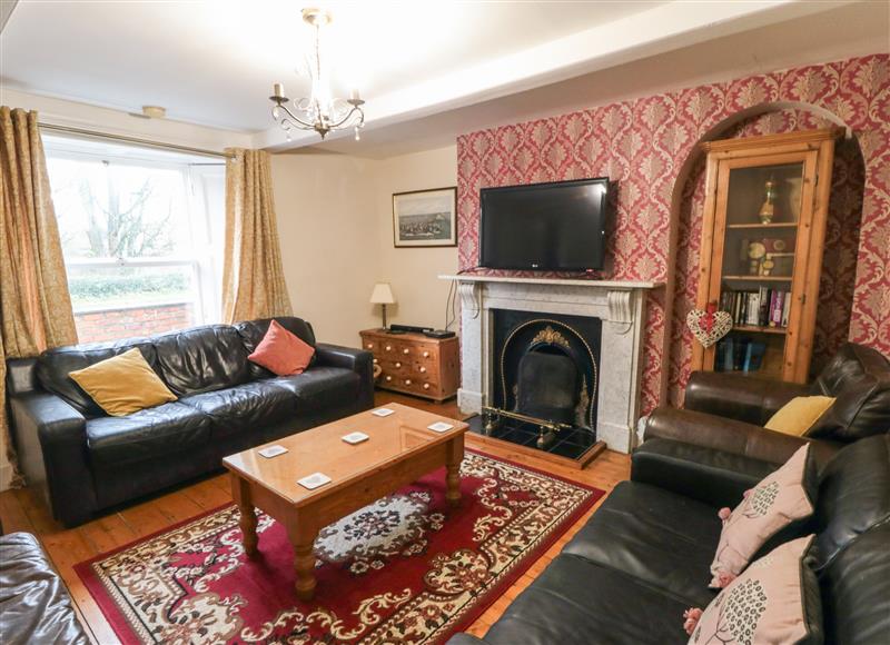 Relax in the living area at Manor Farmhouse, Reighton near Filey