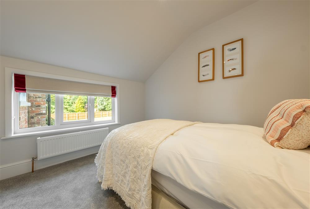 First floor: Bedroom five with twin 3ft beds at Manor House, Beeford