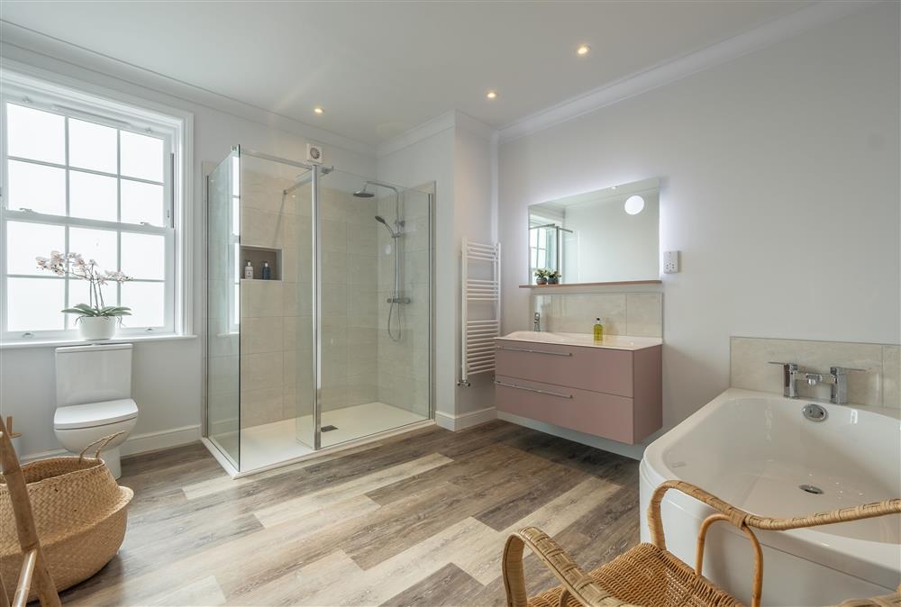 First floor: Family bathroom featuring walk-in double shower at Manor House, Beeford