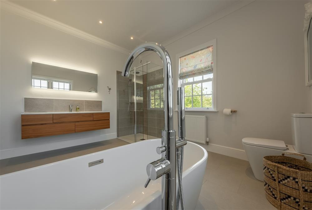 First floor: Luxurious en-suite with freestanding bath at Manor House, Beeford