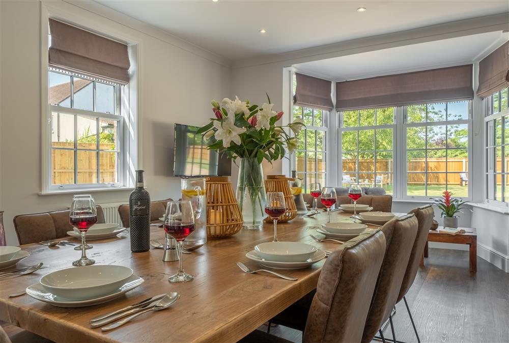 Ground floor: Entertain around the bespoke dining table overlooking the garden at Manor House, Beeford