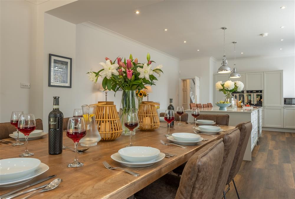 Ground floor: Spacious dining table with seating for 10 guests in the open-plan kitchen at Manor House, Beeford