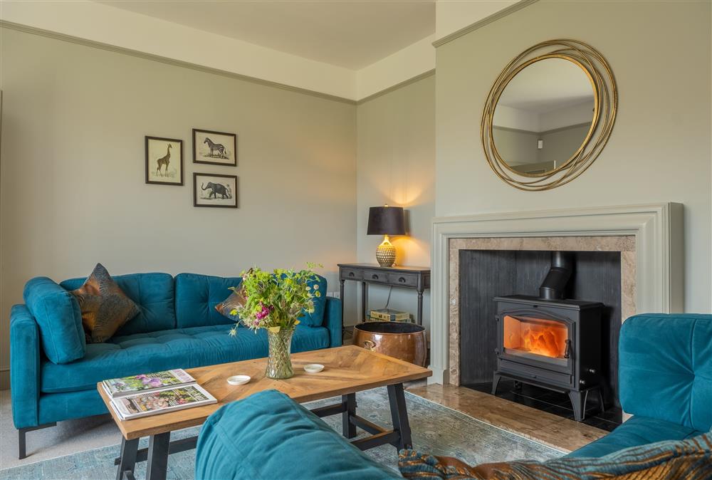Ground floor: Spacious sitting room with sumptuous seating for 10 guests at Manor House, Beeford