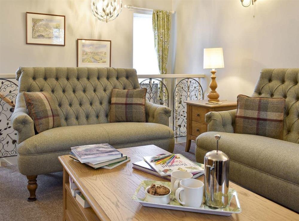 Stylish living room at Manor House Cottage in Holme on Swale, near Thirsk, North Yorkshire