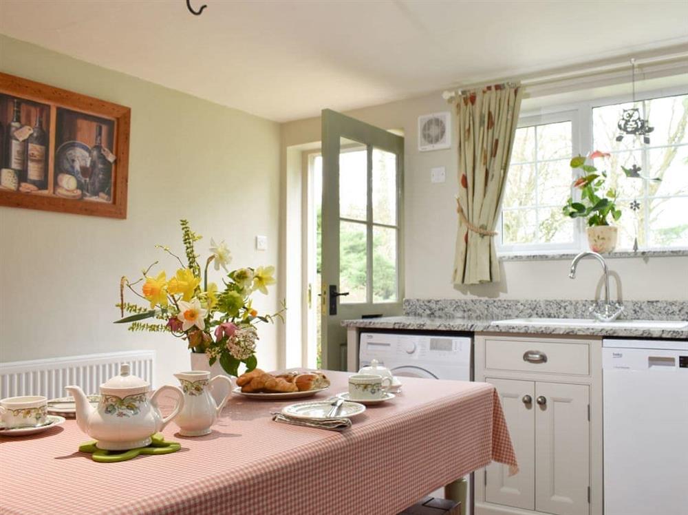 Well-equipped fitted kitchen at Manor House Cottage in Holme on Swale, near Thirsk, North Yorkshire