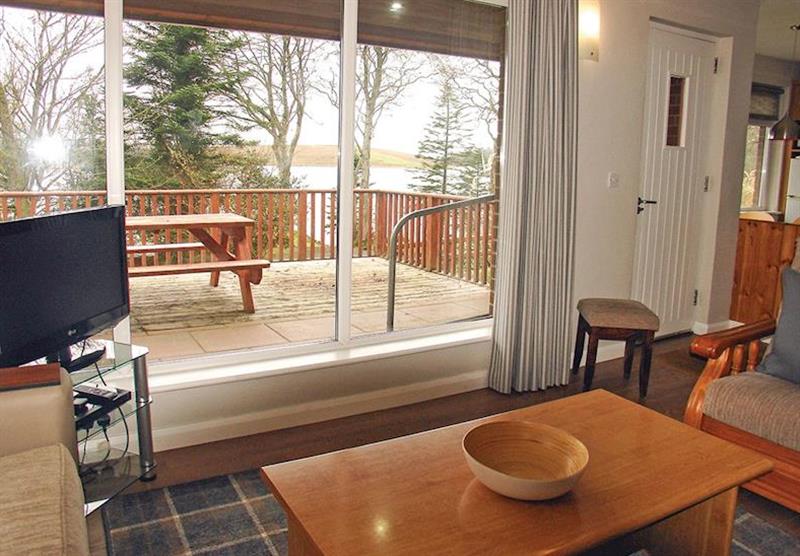 The living room with views to the loch at Marine Cottage at Manor House Cottages in Lough Erne, Killadeas