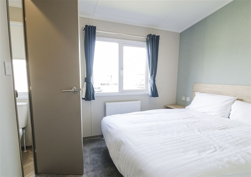 One of the bedrooms at Manor House Gold 2 Bedroom (03F), Maryport near Aspatria