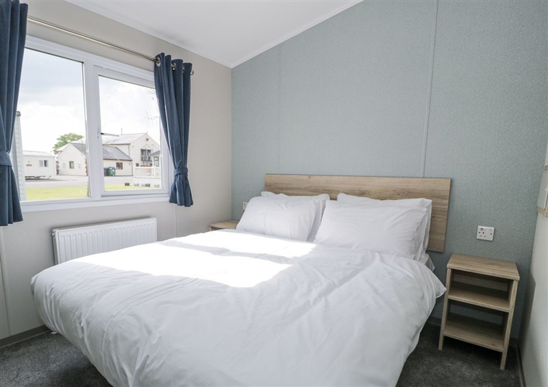 A bedroom in Manor House Gold 2 Bedroom (05F) at Manor House Gold 2 Bedroom (05F), Maryport near Aspatria