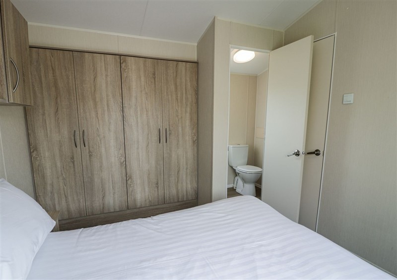 This is a bedroom at Manor House Gold 2 Bedroom (20C), Maryport near Aspatria